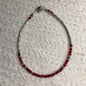 - Swarovski red and silver bracelet with …